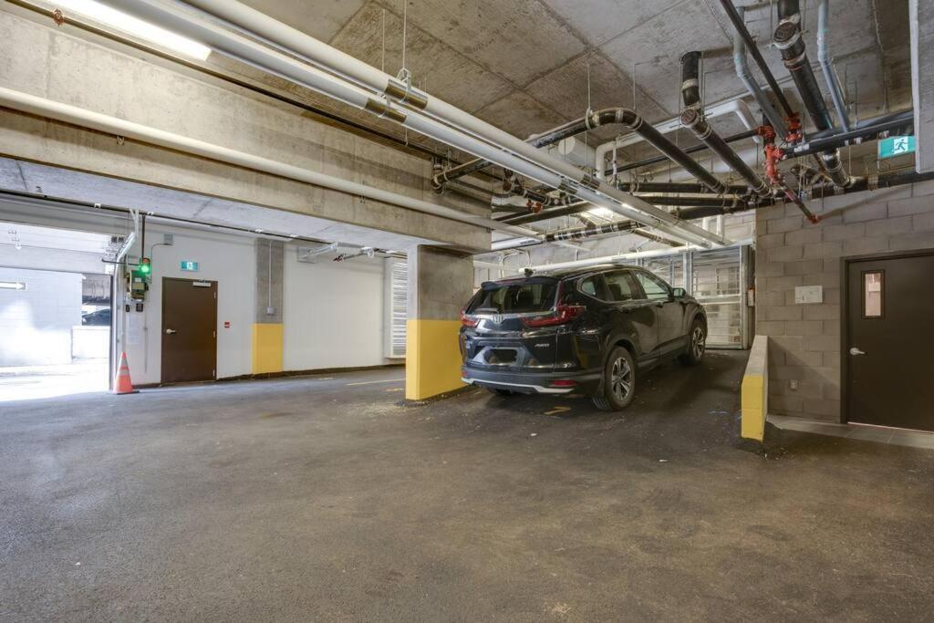 Initial / Yogi+ Parking / Centre-ville De